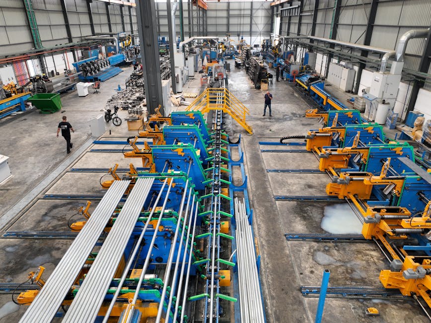 Interior of a large manufacturing plant with machinery and production lines